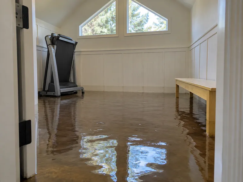 Water Extraction Near Skipcha Park — substantial pool with waterlines and partly submerged lower furniture feet